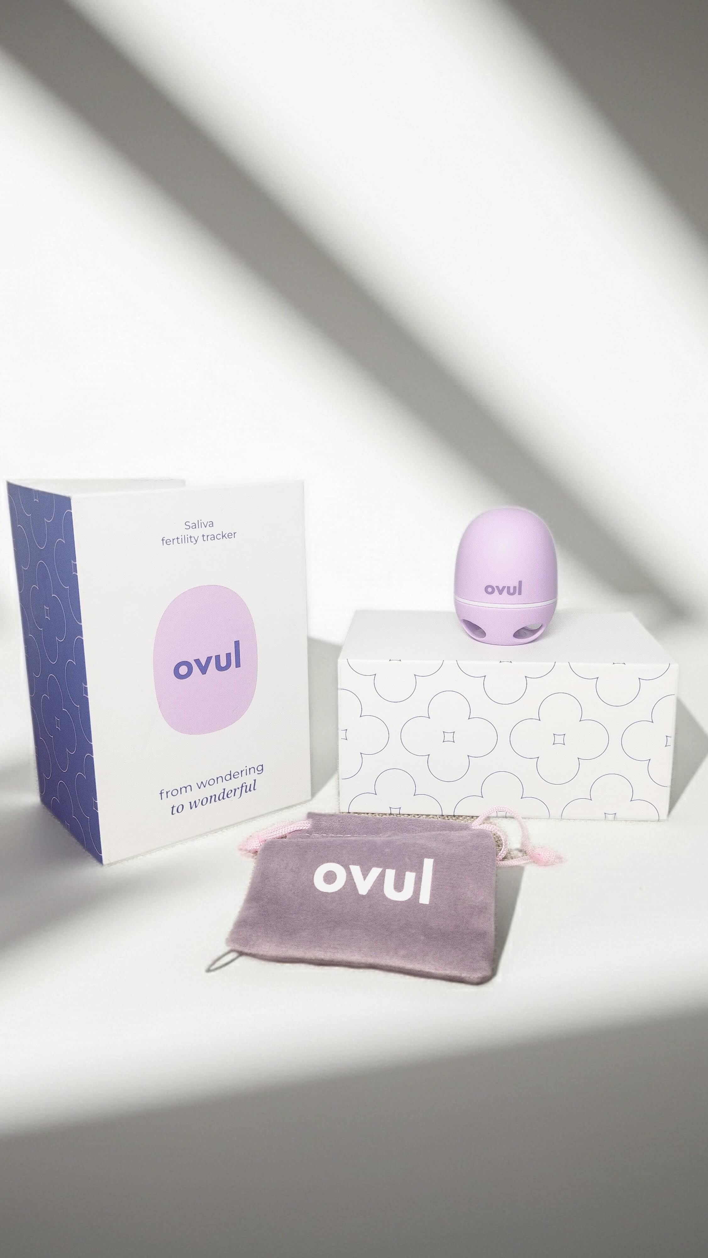 Ovul fertility tracker box set with travel pouch on white background with shadows